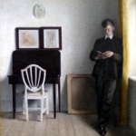 Vilhelm Hammershoi, Interior with Young Man Reading (1898)